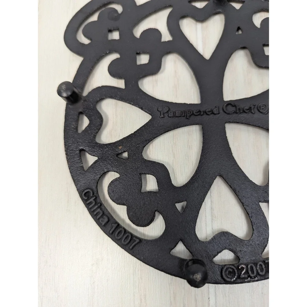 Pampered Chef 2007 copper metal trivet hearts scrolls